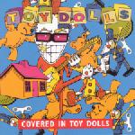 TOY DOLLS - Covered in toys